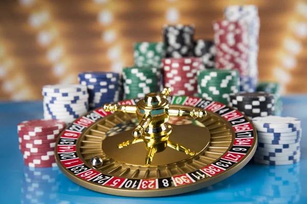 Live casino dealer at blackjack table with multi-camera feed showing cards and player interface